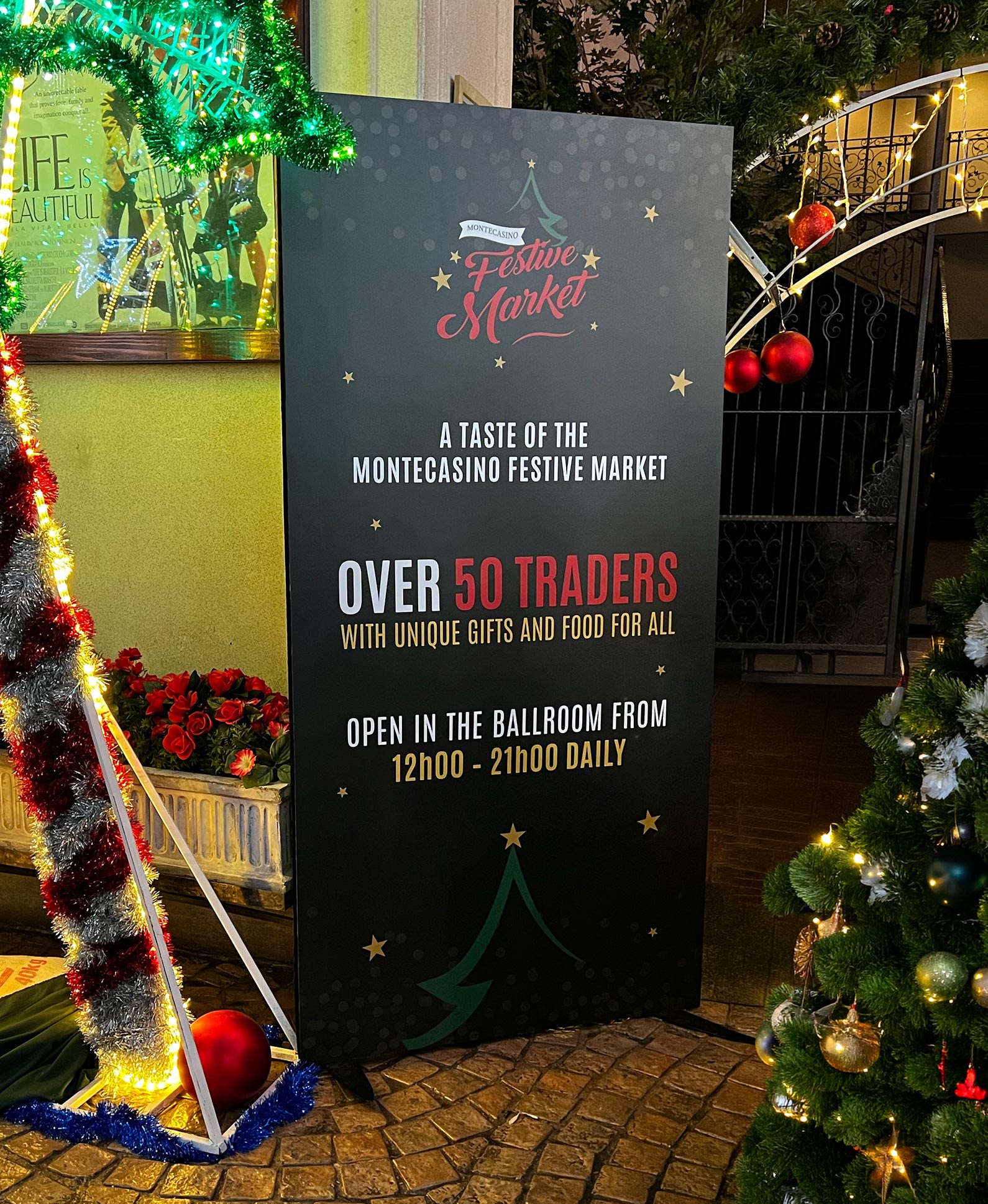 The Festive Market at Montecasino pull-up banner in the venue for Chaos Theory, by Druff Agency Pretoria